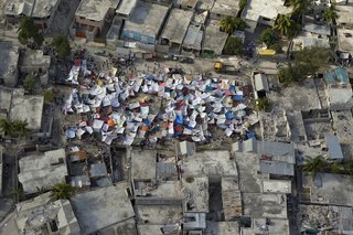 Haitians set up impromtu tent cities thorough the capital after an earthquake measuring 7 plus on the Richter scale rocked Port au Prince, Haiti, just before 5 pm on January 12, 2009.