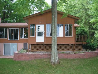 With the help of a local contractor, the Campbells ripped out drywall, reconfigured windows, and gave up a garage in the well-worn ranch house.