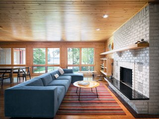 George Nelson and Eames furnishings from Michigan companies like Herman Miller blend seamlessly with original decor from Keith Campbell’s childhood home in Ann Arbor. Seen here is the combined living and dining area.