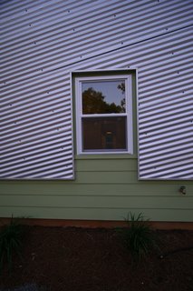 LA Tech-Habitat Home - Photo 9 of 17 - Because the team chose to orient the house along the north-south axis, they limited the number and size of windows on the east and west elevations to reduce heat gain. Photo courtesy of Jared Boudreaux and Tim Hayes.