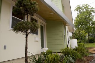 LA Tech-Habitat Home - Photo 10 of 17 - A mutual goal of the students and the resident was to create a home that was inviting to the community. The front and left side of of the home is the public space; the back and majority of the right side is the private space. The back porch is located on the left side of the house and can be seen through the front door. Photo courtesy of Jared Boudreaux and Tim Hayes.