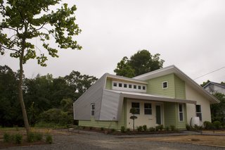 LA Tech-Habitat Home - Photo 17 of 17 - Though the house is quite different from its neighbors, the team worked hard to keep the proportions the same and received positive feedback from the community. Photo courtesy of Jared Boudreaux and Tim Hayes.