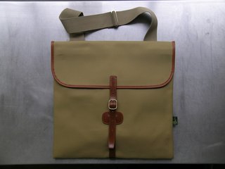 Folio Bag "An archive design selected from the manufacturer's archive. We love the traditional craftsmanship, combined with a contemporary look. Very useful for carrying a laptop." Photo courtesy of Labour and Wait.