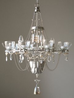 Chandelier by Madeleine Boulesteix, made from reused cups, jelly molds, pastry cutters, and toast racks. On display at the Geffrye Museum in London through February 7, 2010, as part of the Eco Home exhibit.
