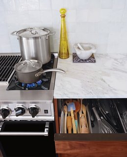 Project Runaway - Photo 8 of 14 - Organization is key: Blum storage systems in the Henrybuilt drawers keep the whisks from ensnaring the spatulas.