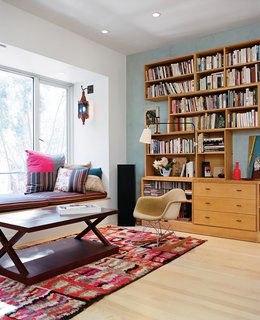 Project Runaway - Photo 7 of 14 - The living room is a mélange of vintage Moroccana, a Philip Agee coffee table, the Eames rocker in which Michael was nursed as a tike, and a window seat whose fabric is Paul Smith Stripes for Maharam.