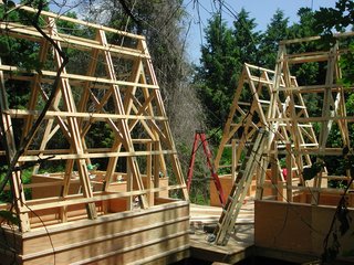 Swamp Thing - Photo 7 of 17 - The shape of the prefabricated trusses was inspired by sails and Moskow's father-in-law's love for boating. The collection of shelters is reminiscent of days past when groups of covered wagons traveled West.