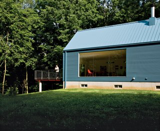 The floor-to-ceiling living-room window was inspired by Philip Johnson’s Glass House.