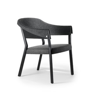 Pierre Sindre’s Button II chair, another new piece debuting at the Stockholm Furniture Fair this week, makes long meetings easier with its new cushioned seat.
