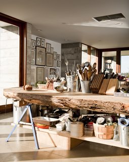 Metal buckets of wooden spoons on the counter don’t amount to visual chaos; rather, they’re evidence of a hands-on existence.
