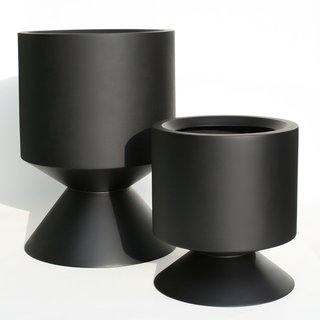 Phase Design’s Griffin planter is as substantial as it is stunning. Made from hand-sanded fiberglass with an automotive polyurethane gloss finish the Griffin measures in at 18-inches high and 16 inches in diameter and the Griffin XL at 28-inches high and 20 inches in diameter. Good for the indoors though better suited for the backyard, the planter can also be complemented with the Griffin Stool/Table, which features the same shape but topped with a 1.5-inch solid walnut butcher board lid.