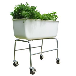 The Food Map Container may look like a bathtub but is the ideal planter. Its lightweight recycled-plastic basin features a contoured drainage system built into the bottom and it sits on a metal-tubing frame and locking rubber casters, which makes moving it a breeze.