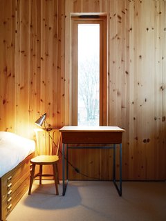 Knotty by Nature - Photo 10 of 25 - The ground floor has a visitor’s bedroom for when Velma has friends over to stay.