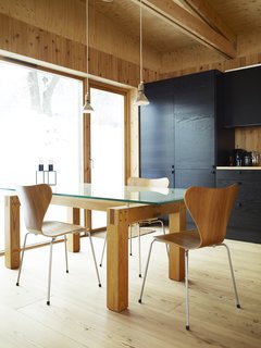 Knotty by Nature - Photo 25 of 25 - Black and blond are a natural match in Bornstein's largely wooden kitchen.