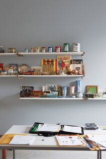 From Brown to Green - Photo 5 of 8 - In the upstairs studio Adams draws inspiration from collections of salesmen’s sample cans, Canadian early-20th-century ceramics, and Electrolux vacuum-cleaner piggy banks.
