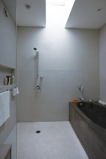 From Brown to Green - Photo 6 of 8 - The main bath has a concrete tub that Fleming cast to fit his wife’s body.