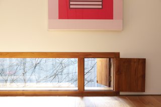 Strategically placed wooden windows like this one is an expression of Cho's style.