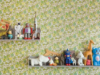 Because their home is a rental, De Waart was limited in the changes she could make. In the boys’ room, she added vintage wallpaper. "From a distance it appears to be all shades of green but when you have a closer look, it turns out to be one big jungle," De Waart says. She covered just a single wall with the paper to keep the room from feeling overrun with color.