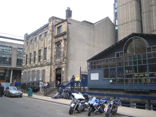 Scotland: Day 4 - Photo 1 of 11 - Here are three buildings (with that brutalist tower glimpsed in back) that are to go in favor of the new Steven Holl building. The Victorian building at the end of the block is home to the Vic, a rather grungy student union and music venue that has birthed a number of Glasgow bands like Franz Ferdinand.