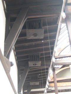 Scotland: Day 4 - Photo 3 of 11 - The vents in the main gallery space in the Glasgow School of Art are hidden in these Japanese lantern-inspired boxes. The massive fan is downstairs and was shipped over at the turn of the century from where it was made in Boston. The cool air was chilled by blocks of ice and the hot air heated by a coal burner.