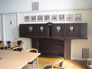 Scotland: Day 4 - Photo 4 of 11 - This hutch is simply too beautiful. The row of photos above charts famous alumnus and administrators at the Glasgow School of Art. Mackintosh (who attended as an architecture student) leads the pack.