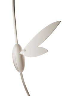 Like a whimsical clock winding key, Ikebana's dimmer switch is both decorative and functional.