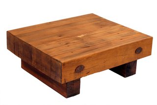 Espasso at Steven Alan - Photo 4 of 10 - Motta designed the blocky Caju side table with a square top, then began offering it with a round top. In the Espasso showroom, the square versions are multiplied and placed together to show the different wood grains.