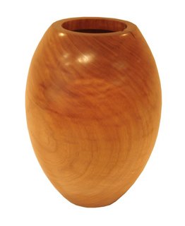 Espasso at Steven Alan - Photo 5 of 10 - Etel Carmona creates her Bojudo vase (which roughly translates to "rounded") from the trunks of fallen native Brazilian trees. In each vase, as in this cedar example, Carmona celebrates the natural cracks and grain of the wood, resulting in one-of-a-kind pieces.