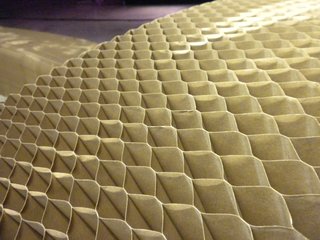 Soft by Molo - Photo 3 of 5 - Despite the thinness of the kraft paper used in the Soft collection, it handily holds a seated adult due to its use of a honeycomb structure to distribute the weight.