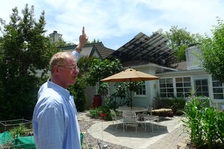 Preview: Ed Begley, Jr. - Photo 3 of 5 - Begley demonstrates how his solar panels are angled to take full advantage of the sun's path.