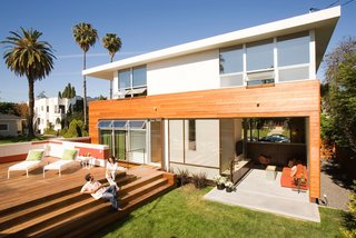 Preview: Eastside Home Tour - Photo 3 of 3 - A large wood platform over the sunken garage serves as an outdoor gathering space.