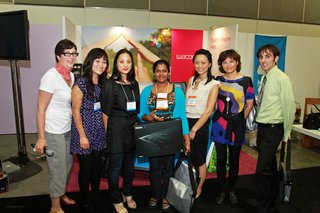coolcapitals Competition Winners - Photo 1 of 4 - Dwell judges alongside Friday's winner Ayanthi Fernand (holding the Wacom Intuos4 tablet) and other contestants.