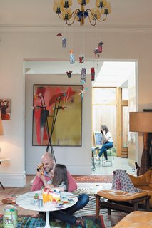 Leather and Brazilian rosewood chairs by Jean Gillon sit next to Angelucci and Pepa in the formal lounge.