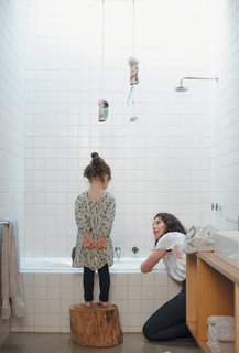 Pepa gets a better view of what Gorman is explaining in the girls’ bathroom from her stump stool.