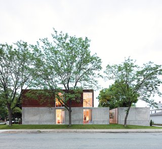 The home’s mix of dark ipe wood, concrete, and glass give credence to Winter’s description of it as "an open bunker."