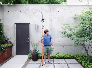 Winter takes care of chores like tree trimming and the tending of his succulents.