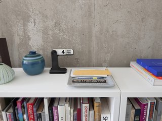 Design tomes, a salient message, mid-century ceramic.