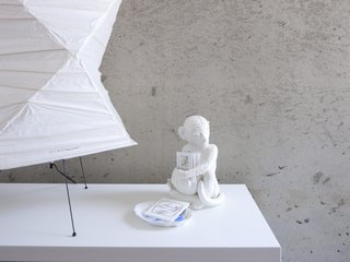 Noguchi lamp, meet the business-card-carrying ceramic monkey.