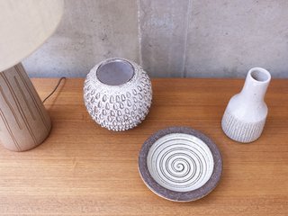 Here's another view of the mid-century ceramics the couple collects and displays around the house.