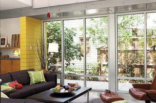 The living room is glazed on both sides and where Rick says he gets most of his work done.
