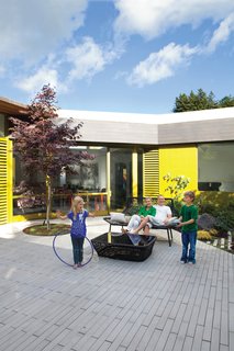 By carving away some of the hillside, the Deams effectively added an outdoor room to their renovated home.