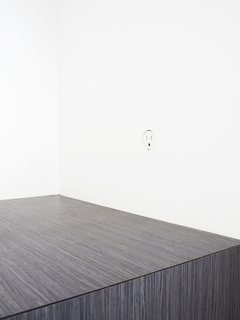It might not make you popular with your contractor, but for a more streamlined look, Chris recommends forgoing trim. "It lends a clean look with less visual clutter," the architect says. In their house, the doors, lights, cabinetry, and even wall sockets (all 22 by Bocci) are installed without trim. This allows the planar surfaces to recede and do their jobs without unnecessarily distracting the eye.