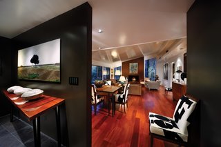 Triangle House Tours - Photo 27 of 30 - The interior is expressed through a series of simple planes that allow each space to flow to the next.