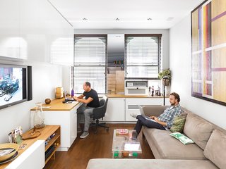 Architect Darrick Borowski, designed the nearly wall-size custom cabinetry.