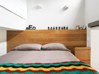 To maximize space, both sides of the bed are outfitted with wall sockets and reading lights.