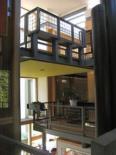 But don’t mistake the vibrant colors or hovering masses for Postmodernist work like the colliding geometries of Daniel Libeskind, Guyon warns, the narrative for this building could not be more different.