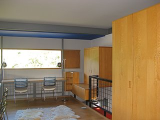 A view of one of the boys’ bedroom shows how the furniture was built into the wall and the relationship of walls to the floor, making clear, as Guyon has described, that this is really "an experiment masquerading as a house." As is indicative of a pure Modernist home, all glass is fixed, with separate screened compartments for ventilation. Circulation and places of repose are also separated. As one can see at the right of the frame, the box is denied, the cube explodes, things come apart and nothing directly touches. "Its not egalitarian, its completely elite. Though many find it to be bare bones, its just really intense in its craft," says Guyon.