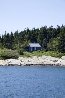 One of the early challenges of building the house was defining the property lines of the lot, which had come to be known as "the floating acre" among the local fishermen.