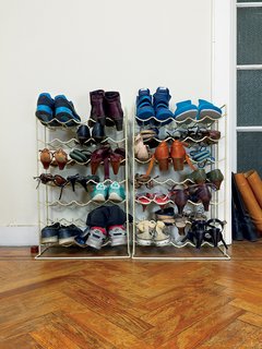 Kind of New - Photo 8 of 15 - In the entryway, wine racks are reborn as a place to keep shoes.