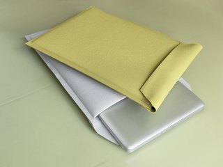 Kind of New - Photo 15 of 15 - Högner designed Envelopes to store laptops because she couldn't find any sleeves she liked--and that protected the laptop if it fell--on the market.